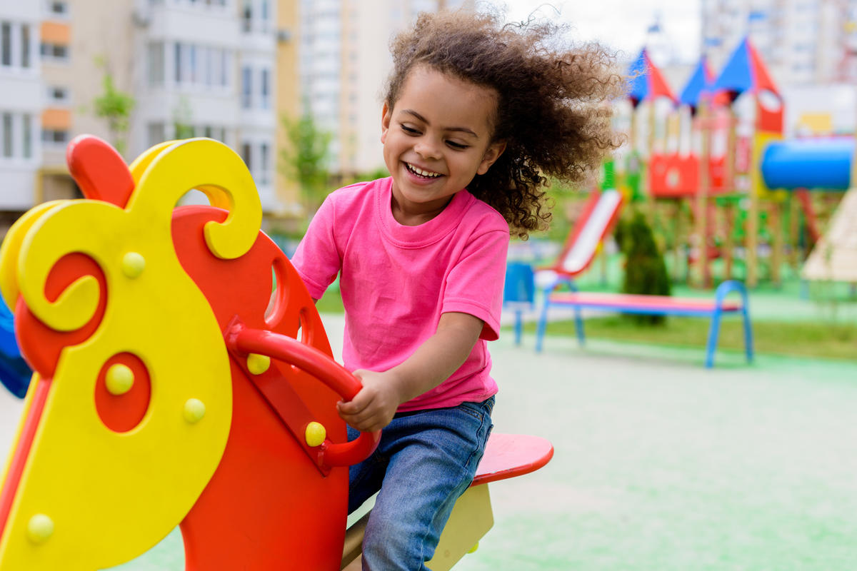 Children enjoying outdoor play twice a day
